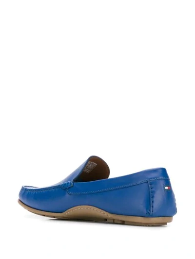 Shop Tommy Hilfiger Logo Embossed Loafers In Blue