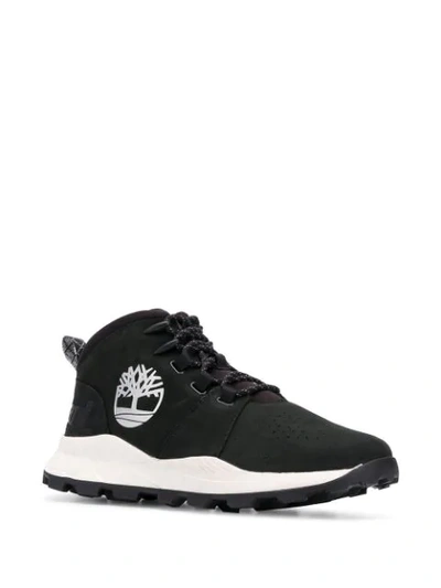 Shop Timberland Logo Low Top Sneakers In Black
