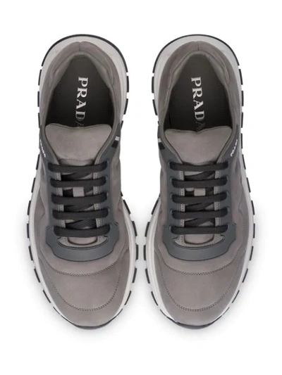 Shop Prada Logo-appliquéd Sneakers In Grey