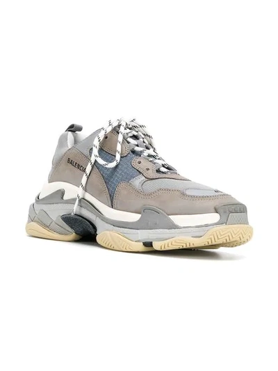 Shop Balenciaga Triple S Sneakers In Grey