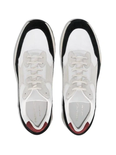 BLACK AND WHITE TRACK LOW TOP LEATHER SNEAKERS