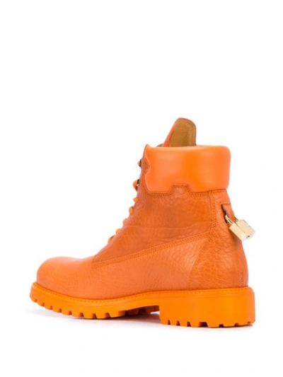 Shop Buscemi Site Padlock Detail Boots In Orange