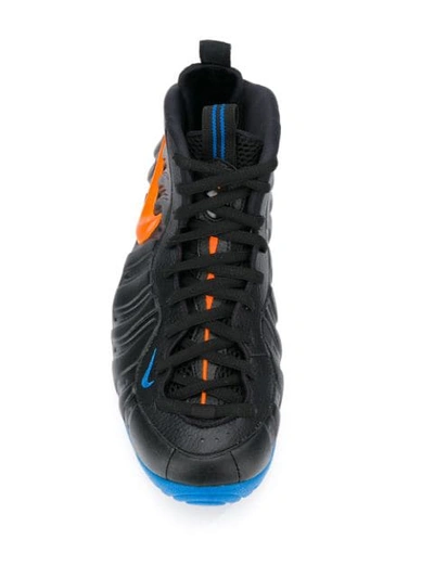 Shop Nike Foamposite Pro Sneakers In Black