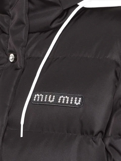 Shop Miu Miu Belted Padded Coat - Black