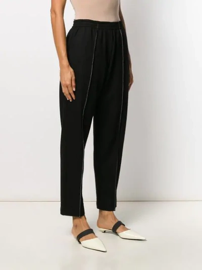 Shop Jil Sander Contrast Stitches Trousers In Black
