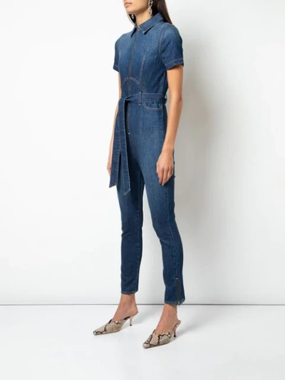 Shop Alice And Olivia Gorgeous Denim Jumpsuit In Blue