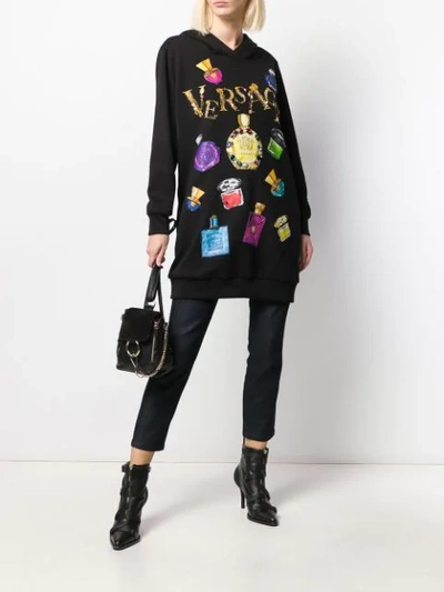 Shop Versace Graphic Print Embellished Hoodie In Black