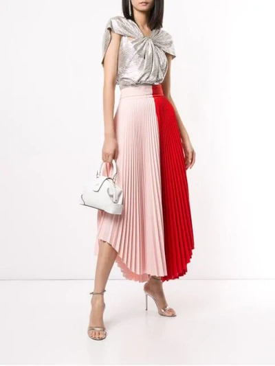 DOUBLE TROUBLE PLEATED SKIRT