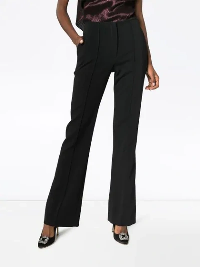 Shop Carolina Herrera Flared Tailored Trousers In Black