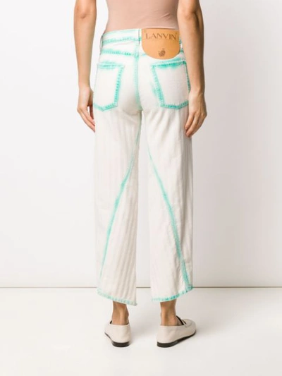 Shop Lanvin Asymmetric Cropped Jeans In White