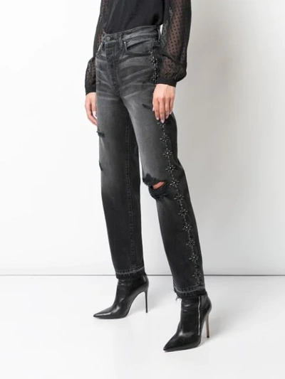 Shop Amiri Broken Side Stud Straight Jeans In Black