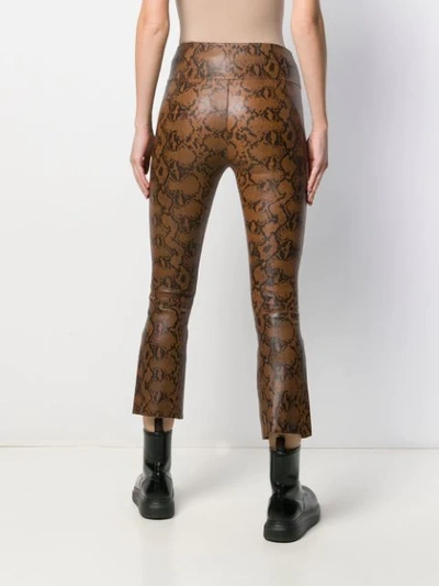 Shop Sprwmn High Rise Snakeskin Print Trousers In Brown
