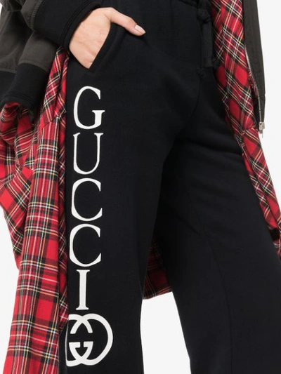 Shop Gucci Large Logo Print Track Pants In 1289 Black