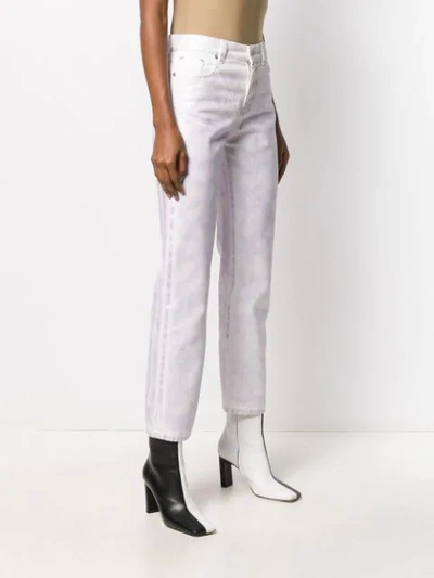 Shop Msgm Cropped Tie-dye Jeans In White