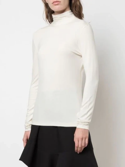 Shop Akris Punto Fitted Turtleneck Top In White