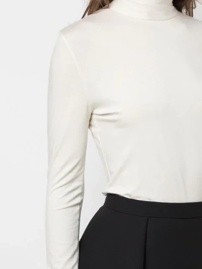 Shop Akris Punto Fitted Turtleneck Top In White