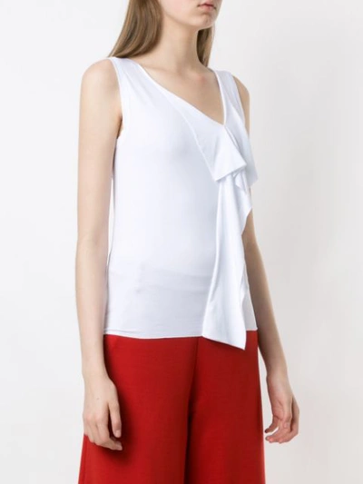 Shop Gloria Coelho Ruffled Sleeveless Blouse In White