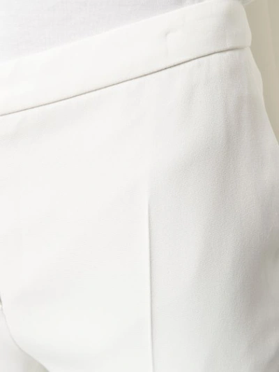 Shop Escada Slim Trousers In White