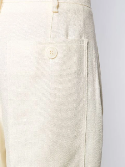 Shop Jacquemus Pleated Details Wide-leg Pants In White