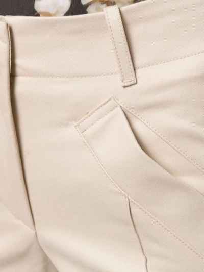 Shop Jejia Pipe-trim Flared Trousers In Neutrals