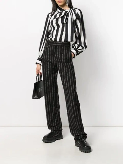 Shop Msgm Pussy Bow Striped Blouse In Black