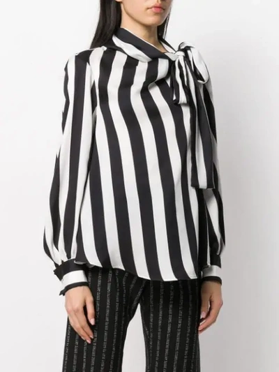 Shop Msgm Pussy Bow Striped Blouse In Black