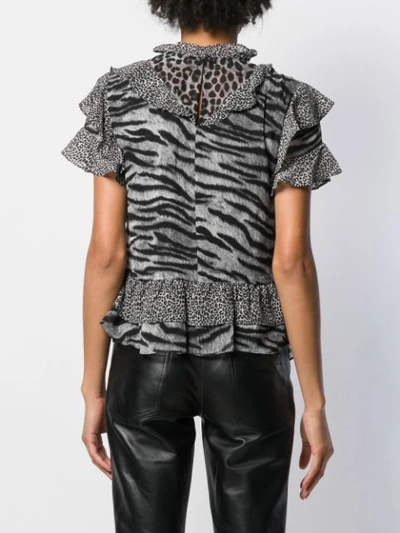 Shop Michael Michael Kors Animal Print Ruffle Blouse In Black