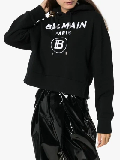Shop Balmain Printed Logo Cropped Hoodie In Black