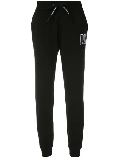 Shop Armani Exchange Logo Patch Track Pants In Black