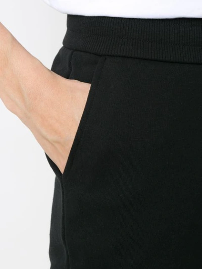 Shop Armani Exchange Logo Patch Track Pants In Black