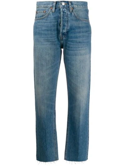 Shop Re/done Unfinished Hem Tapered Jeans In Blue