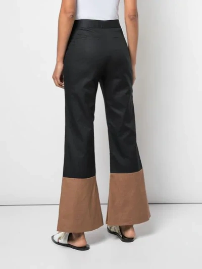 Shop Arias Two-tone Flared Trousers In Black