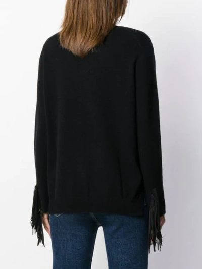 V-NECK TASSEL SLEEVE SWEATER