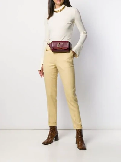 Shop Chloé High-waisted Slim-fit Trousers In Yellow