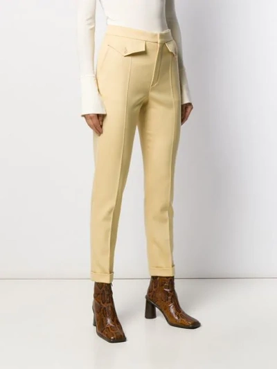 Shop Chloé High-waisted Slim-fit Trousers In Yellow