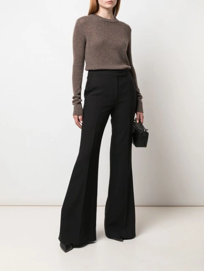 Shop Gabriela Hearst High-rise Flared Trousers In Black