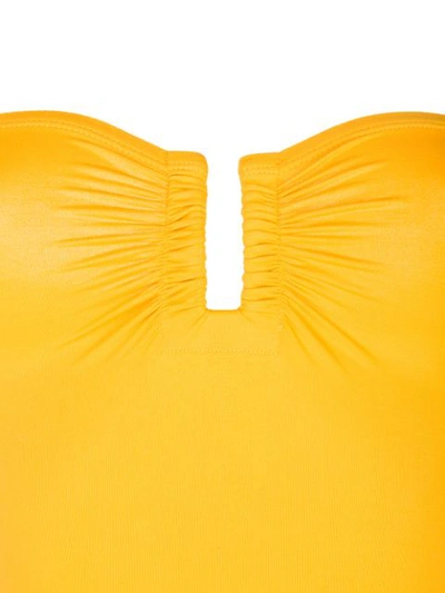 Shop Eres Strapless Swimsuit In Yellow