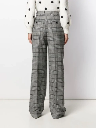 Shop Dolce & Gabbana Prince Of Wales Check Trousers In Black