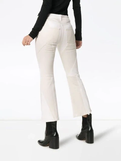 Shop Alexander Mcqueen Bootcut Mid-rise Jeans - White