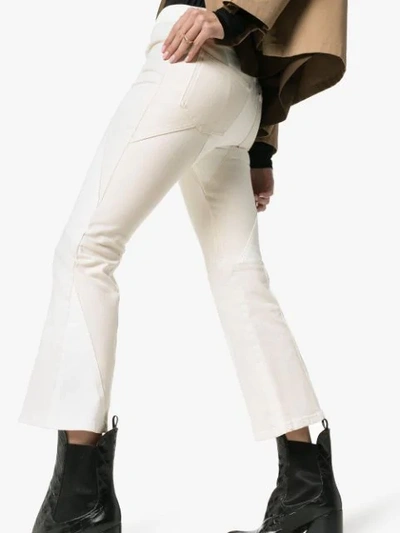 Shop Alexander Mcqueen Bootcut Mid-rise Jeans - White