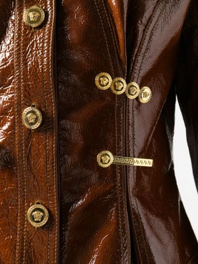 Shop Versace Safety Pin-embellished Leather Jacket In Brown