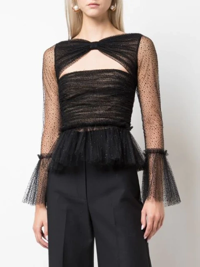 Shop Khaite Sheer Peplum Blouse In Black