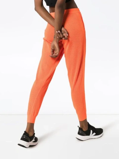 Shop Adam Selman Sport Mid-rise Mesh Track Pants In Orange