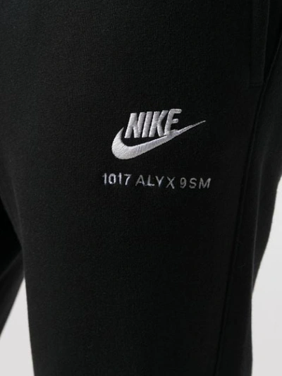 Shop Alyx Layered Hem Track Pants In Black