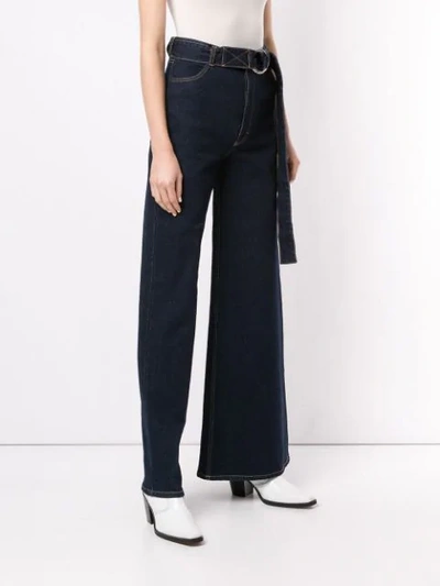 Shop Kseniaschnaider Asymmetric Fit Jeans In Blue