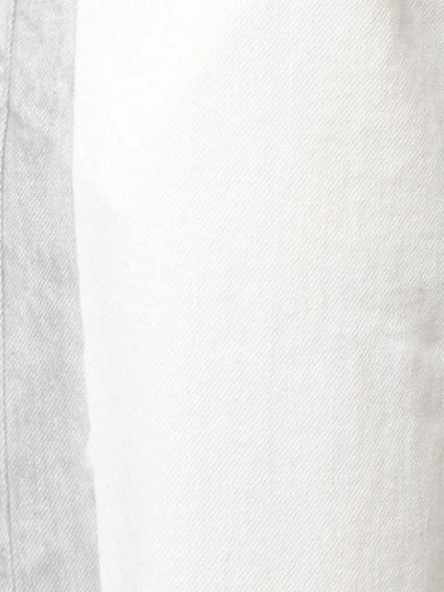 Shop Ambush Reflective Paint Denim Jeans In White