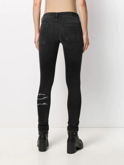 Shop Diesel Barbed Wire Skinny Jeans In Black