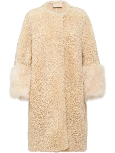Shop Prada Fur Cuff Teddy Coat In Brown