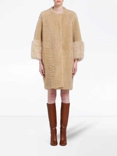 Shop Prada Fur Cuff Teddy Coat In Brown