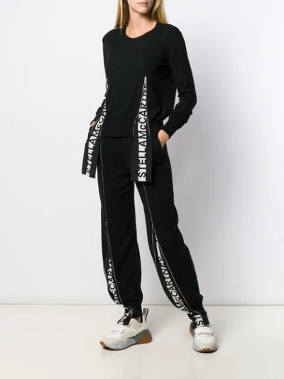 Shop Stella Mccartney Logo Band Zipped Trousers In Black